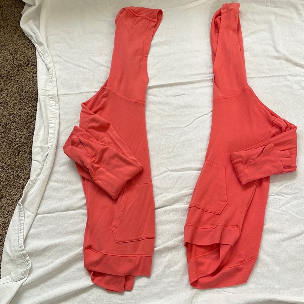 All in motion sports wear tangerine orange pink.